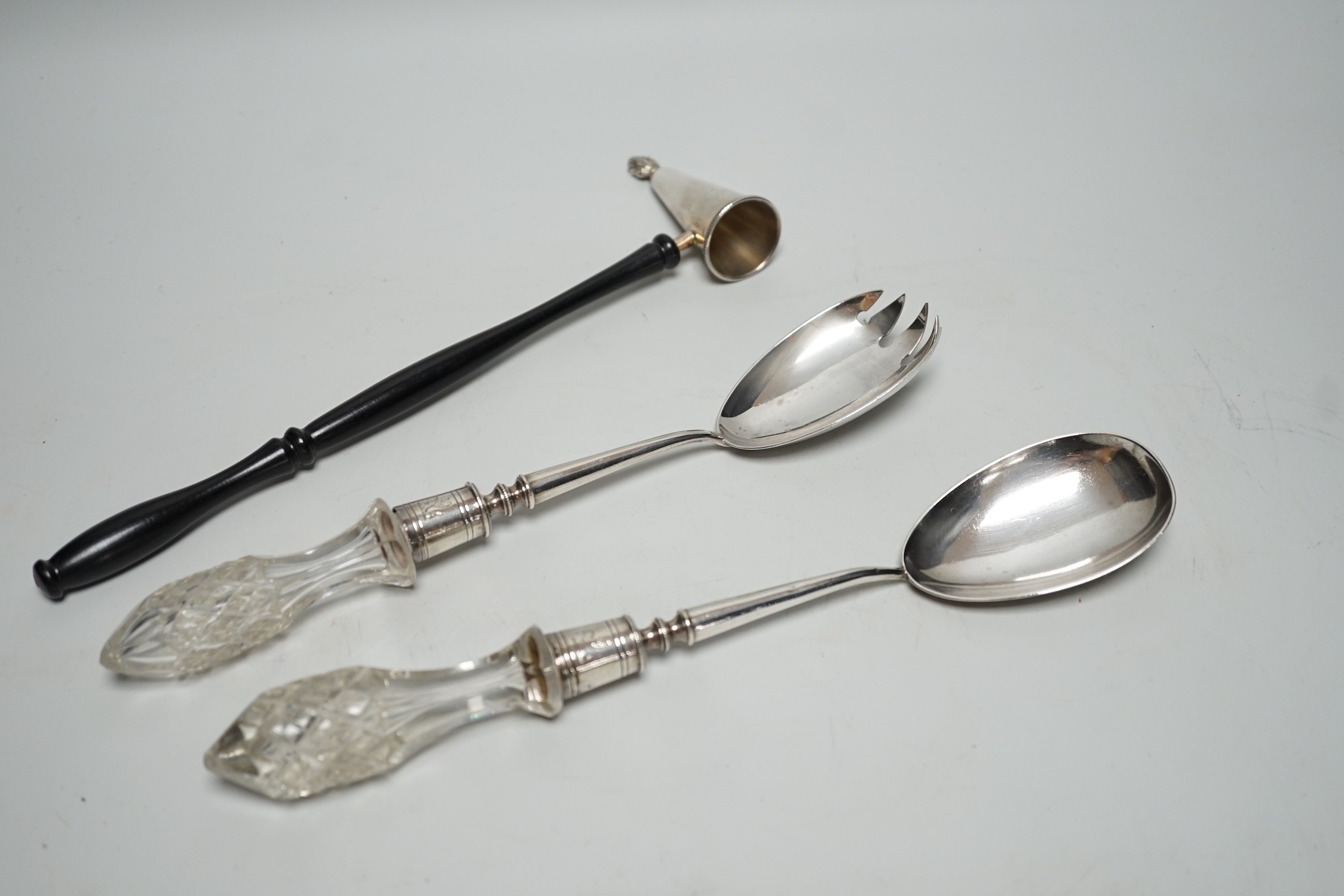 A pair of Edwardian glass handled silver salad servers, Sheffield, 1901, 26.9cm together with a modern wooden handled silver extinguisher and a pair of plated candle snuffers.